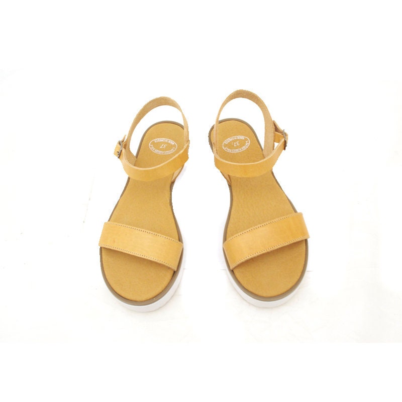 platform sandals with white sole