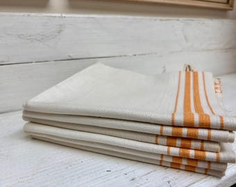 Toalla de cocina de algodón vintage de Niagara Textile Co. con franja amarilla/naranja.