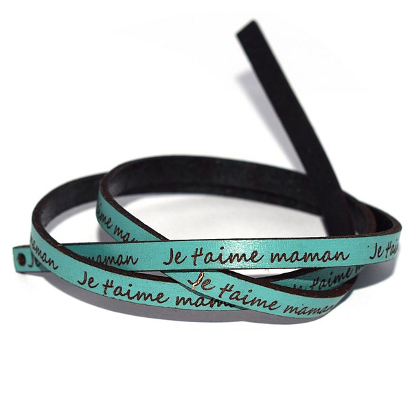 1 lanière " Je t'aime maman  "( +/- 59 - 60 cm)  turquoise (bleu / vert)   écriture noir 5 mm (fête des mères)