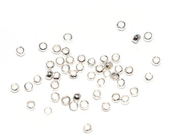 100, 200 or 500 Crushing bead 2 mm shiny silver metal (small blocking/spacer bead)