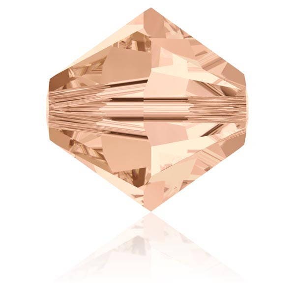 Lot de 20 - 50 ou 100 toupies Swarovski  4 mm light peach (beige clair) - Ref: 2106