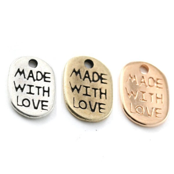 5, 10, 20 ou 50 breloque   "Made with love" (fabriquer avec amour) 8x11mm argenté, bronze ou or rose (rose gold)