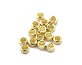 100 , 200 ou 500 Perle à écraser 2.5 mm   métal doré (métal or jaune)  (petite perle de blocage / intercalaire)