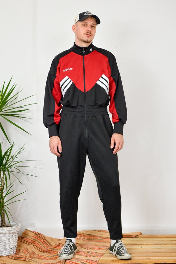 adidas the brand with the 3 stripes tracksuit