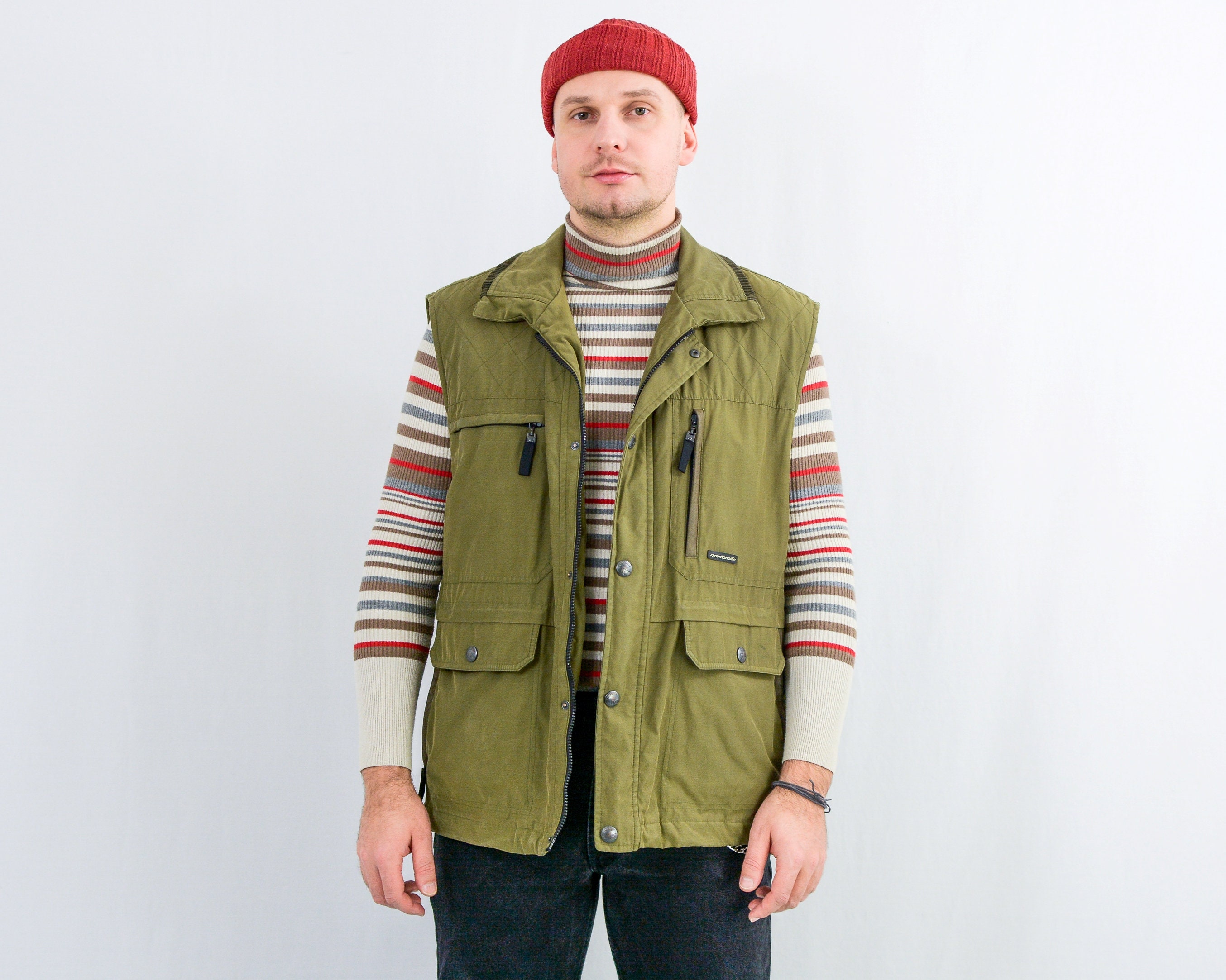 sleeveless green jacket