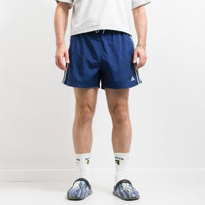 Vintage 90s Adidas shorts | blue nylon | men&#39;s size M/L