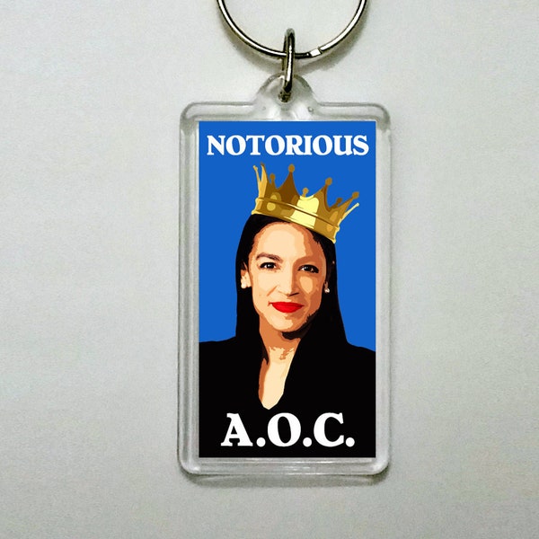 The Notorious AOC - Alexandria Ocasio-Cortez Keychain. A.O.C. Political KeychainKeychain Size - 1-3/8” Wide x 3-3/4” Tall.