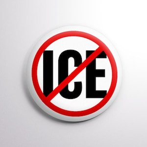 May include: A white button with a red border and a red diagonal line through the word "ICE" in black, centered on a white background. The button is a round shape.