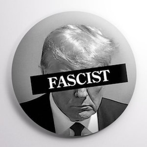 May include: A black and white photo of a man with the word "FASCIST" in white letters across his forehead.