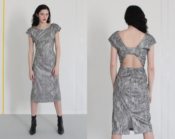 80s does 50s bombshell bodycon bow tie cut out mid