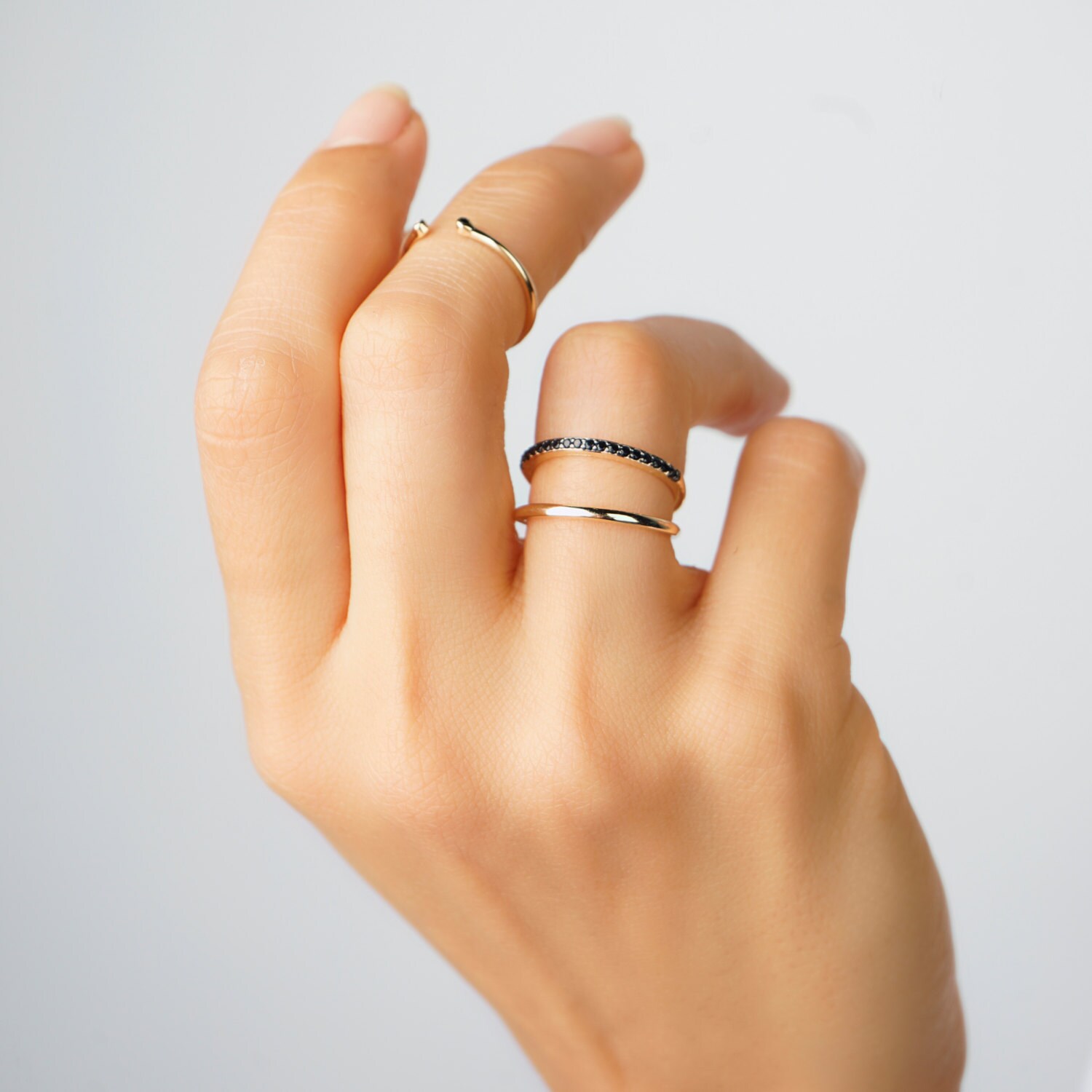 Gold double ring with black stone main image 0