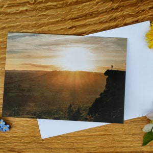 Admiring the view from Curbar Edge A6 Greeting Card and Canvas Print