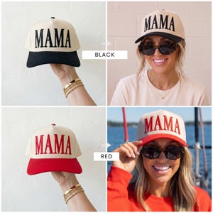 May include: Baseball caps in black and red with the word "MAMA" embroidered in bold letters. The caps have a beige crown and a black or red brim. The image shows the caps being held up and worn.