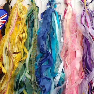 20x1m Grab Bag of Ribbons. Huge mix of ribbon colours, widths & styles. A random selection will be sent in the bundle. Free UK Delivery.