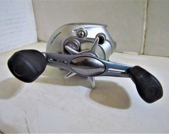 3d Printed Wall Mounted Bait Caster Reel Holder - Etsy 3d Printed Wall Mounted Bait Caster Reel Holder - Etsy