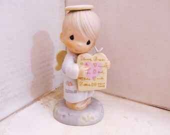 Precious Moments 1989 " The Greatest of These is Love " Figurine
