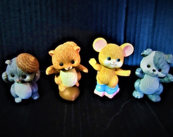 Avon Source of Fine Collectibles Series Figurines