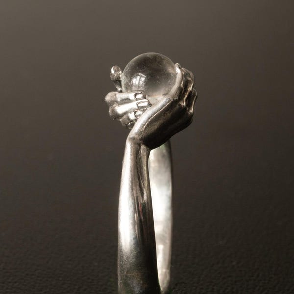 Sterling Silver Spinner Ring – Hands Holding Glass Orb, Calming Meditation Jewelry