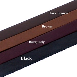 May include: Four leather straps in different colours: black, burgundy, brown, and dark brown.