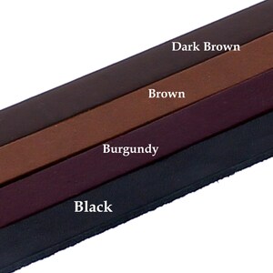 May include: Four leather straps in different colors: black, burgundy, brown, and dark brown.