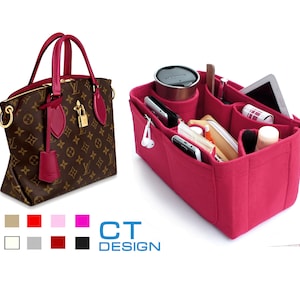 May include: A pink felt handbag organizer with multiple compartments for carrying items like a phone, wallet, and makeup. The organizer is shown inside a brown and tan patterned handbag.