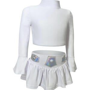 White two-piece space princess rash guard swimsuit with holographic belt and long sleeves, inspired by sci-fi galactic costumes

Girls white space-themed swimsuit with long sleeve crop top and skirted holographic belt, perfect for poolside cosplay or dress-up

Star Wars-inspired toddler swimsuit set with shiny galactic belt and long sleeves for sun-safe swimwear and imaginative play