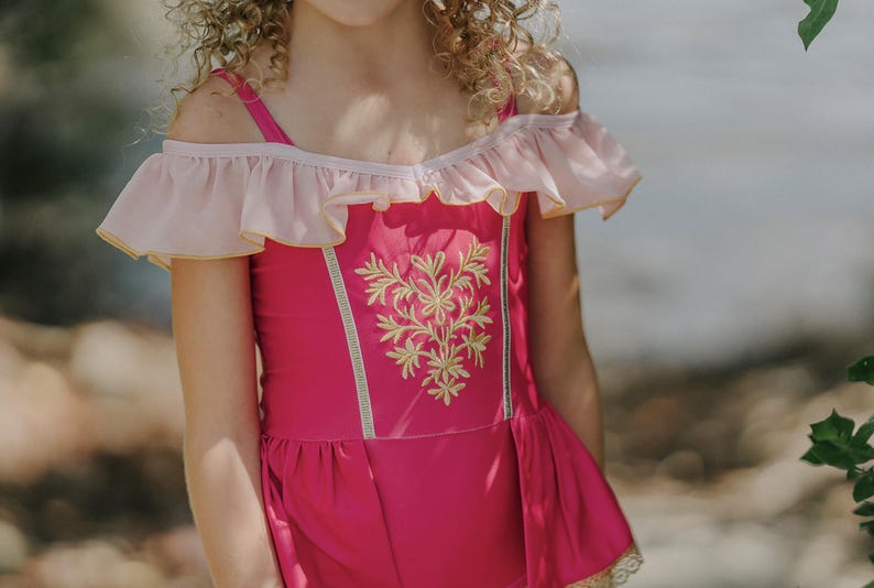 Sleeping Beauty inspired girls one-piece swimsuit with gold embroidered bodice and peplum waist
