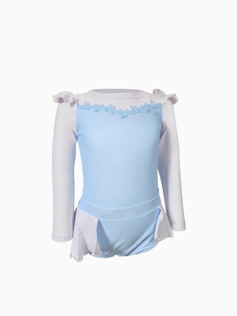 One-piece girls swimsuit with long sleeves and ballgown-style peplum inspired by Cinderella, styled for fairytale pool fun

Girls UPF swim rash guard in Cinderella blue with embroidered neckline and ruffle sleeves for toddler princess beachwear

Blue and white long sleeve princess rash guard swimsuit with peplum skirt, styled for toddler sun safety and fairytale flair