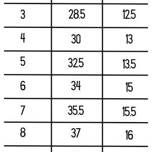 May include: A black and white sizing chart with the title "Sizing Chart" in cursive script. The chart lists sizes 2 through 14, with corresponding length and 1/2 chest measurements in inches. The unit of measurement is also listed.