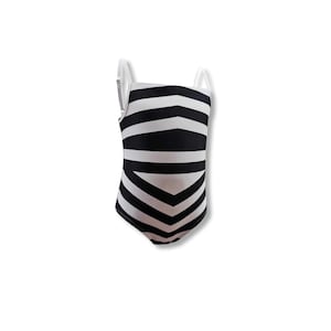 May include: Black and white striped swimsuit with thin white straps.