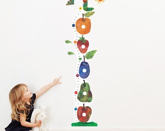 May include: A colorful, illustrated growth chart featuring a caterpillar, fruit, and leaves. The chart is labeled "Olivia" and is designed to track a child's height.