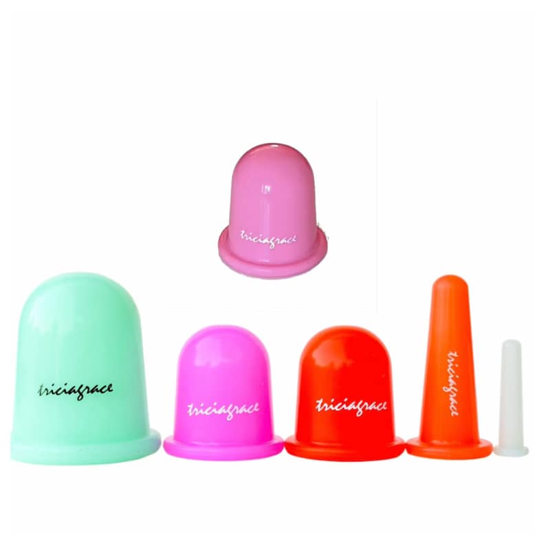 May include: Set of five silicone suction cups in pink, green, orange, and white. The cups are labeled "triciagrace".