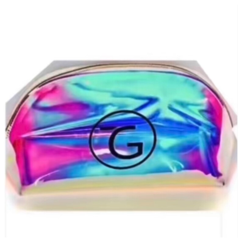 May include: A holographic iridescent makeup bag with a gold zipper and a black circle with the letter "G" in the center.