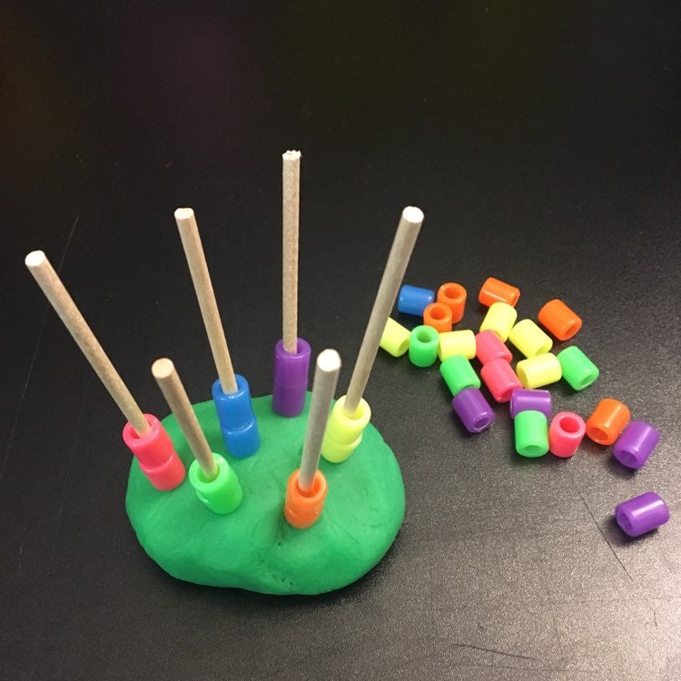 montessori threading toy