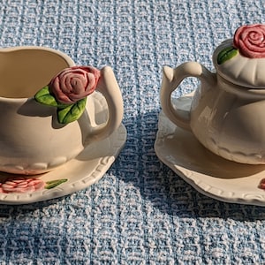 Vintage cream and sugar set, with plates, decorated with sweet roses