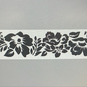May include: Black and white floral design with a repeating pattern of stylized flowers and leaves.