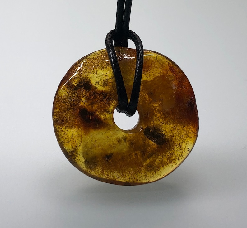 Natural Baltic amber amulet Baltic amber donut yellow brown color amber ring with black string