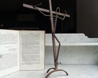 iron crucifix, curiosity, brutalist statue, vintage French