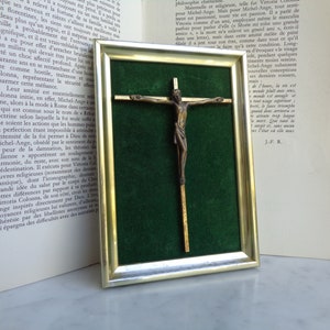 golden frame with crucifix on green velvet, religious decoration, object of devotion, vintage french