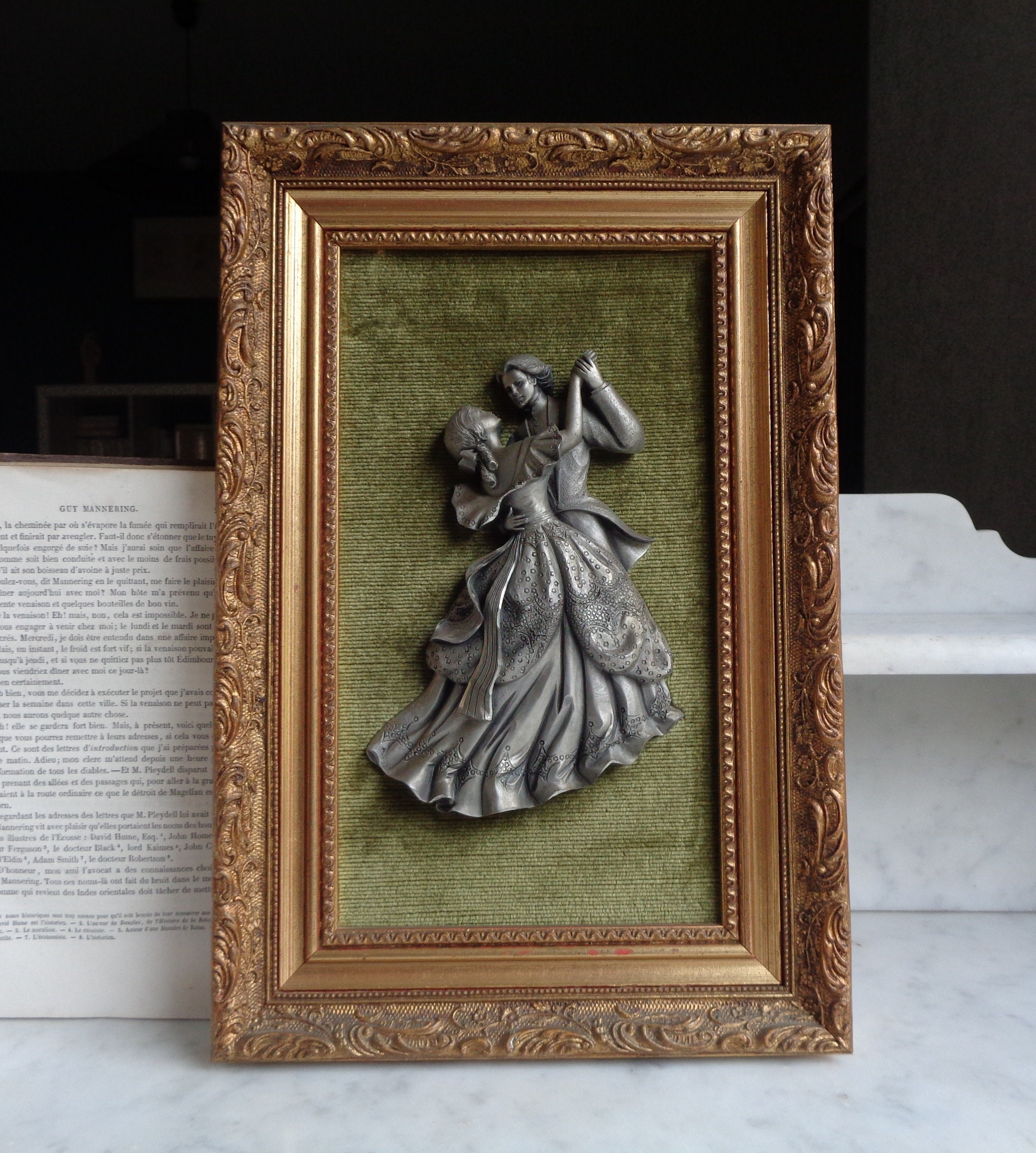 Gilded Wooden Frame With Pewter Figures on a Velvet