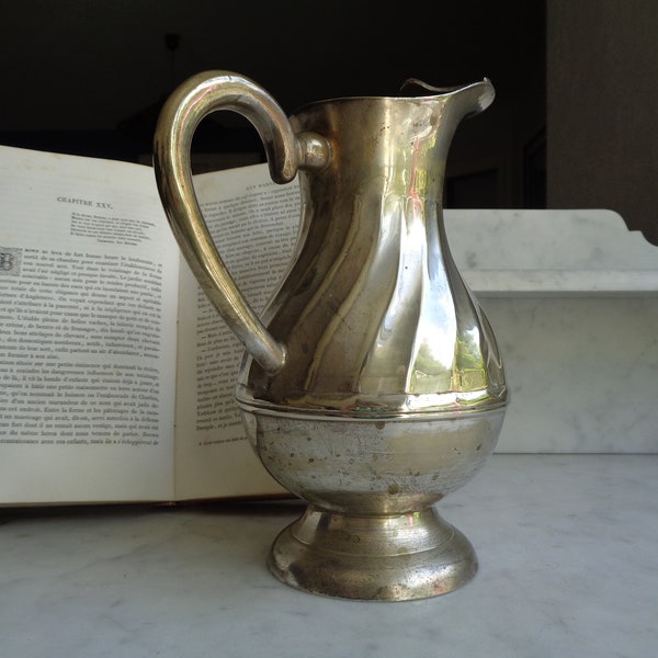 Old ewer in silver shabby chic style, country chic, Victorian