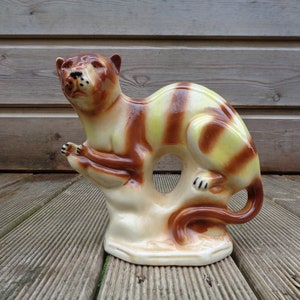 Figurine of feline decorative art in ceramic, leopard or panther stylized retro, statue in vintage earthenware, Decor France 1930 collection