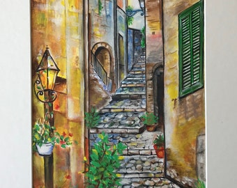 May include: An acrylic painting of a European street scene. The artwork depicts a cobblestone street with steps, flanked by buildings in shades of yellow, brown, and blue. A green shutter and a street lamp are visible.