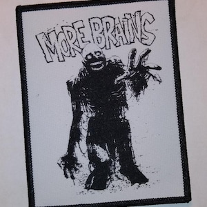 PATCH - Mehr Köpfchen! GEWEBEN, zum Aufbügeln - Tarmans Rückgabe der lebenden Toten