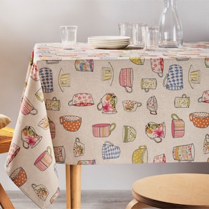 May include: A beige linen tablecloth with a colorful teacup pattern. The tablecloth features a variety of teacups, saucers, and teapots in various colors and designs. The tablecloth is perfect for adding a touch of whimsy to any dining table.