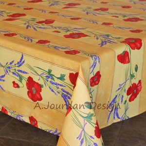 May include: Yellow and white striped tablecloth with a floral pattern of red poppies and purple lavender. The tablecloth is made of a woven fabric and has a subtle sheen.