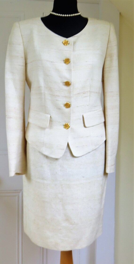 tuta kenzo nera e dorata