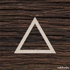 May include: A white wooden triangle shape cutout on a dark brown wood background.