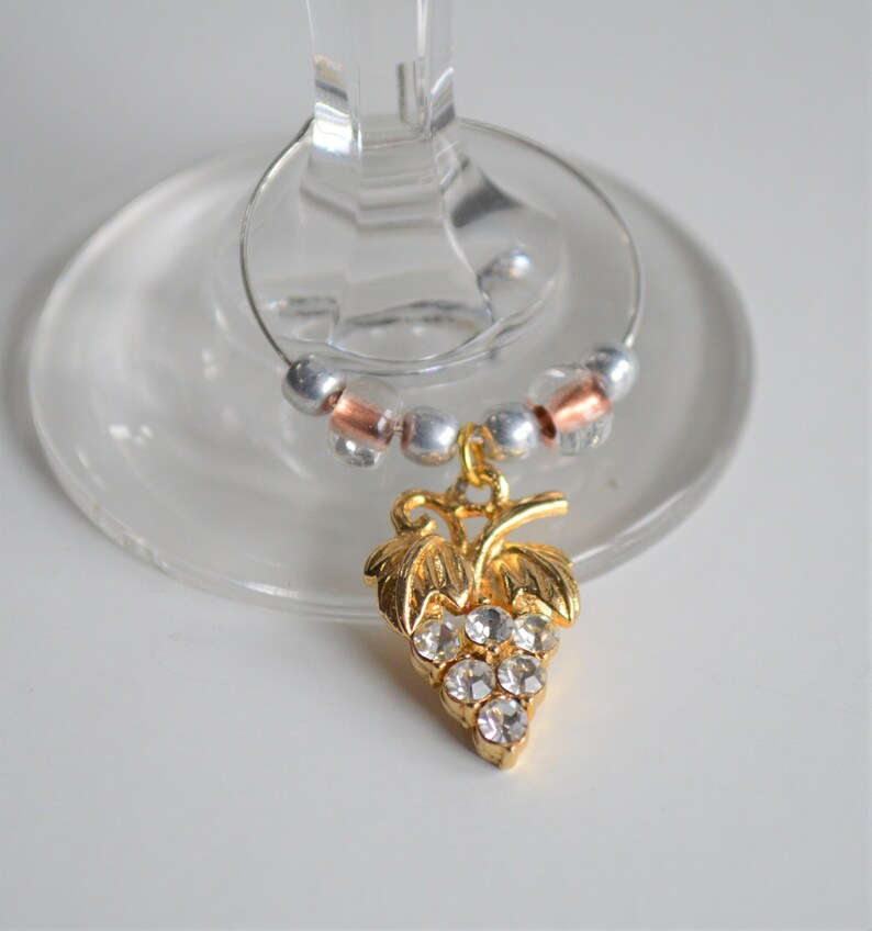 Fun Set of Mixed Gold Tone Wine Charms ~ Set of Four \u2013 Russian Doll Key Grape Cluster and Art Deco Triangle ~ READY TO SHIP