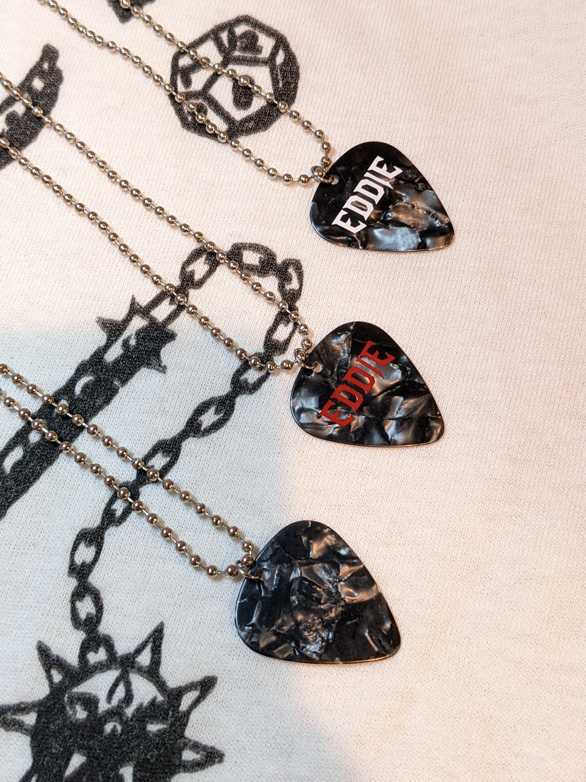 PLABBDPL Hellfire Club Eddie Munson Plectrum Necklace Printed Plectrums Pendant  Necklace Gift Pack of 2, Metal : Amazon.com.au: Musical Instruments